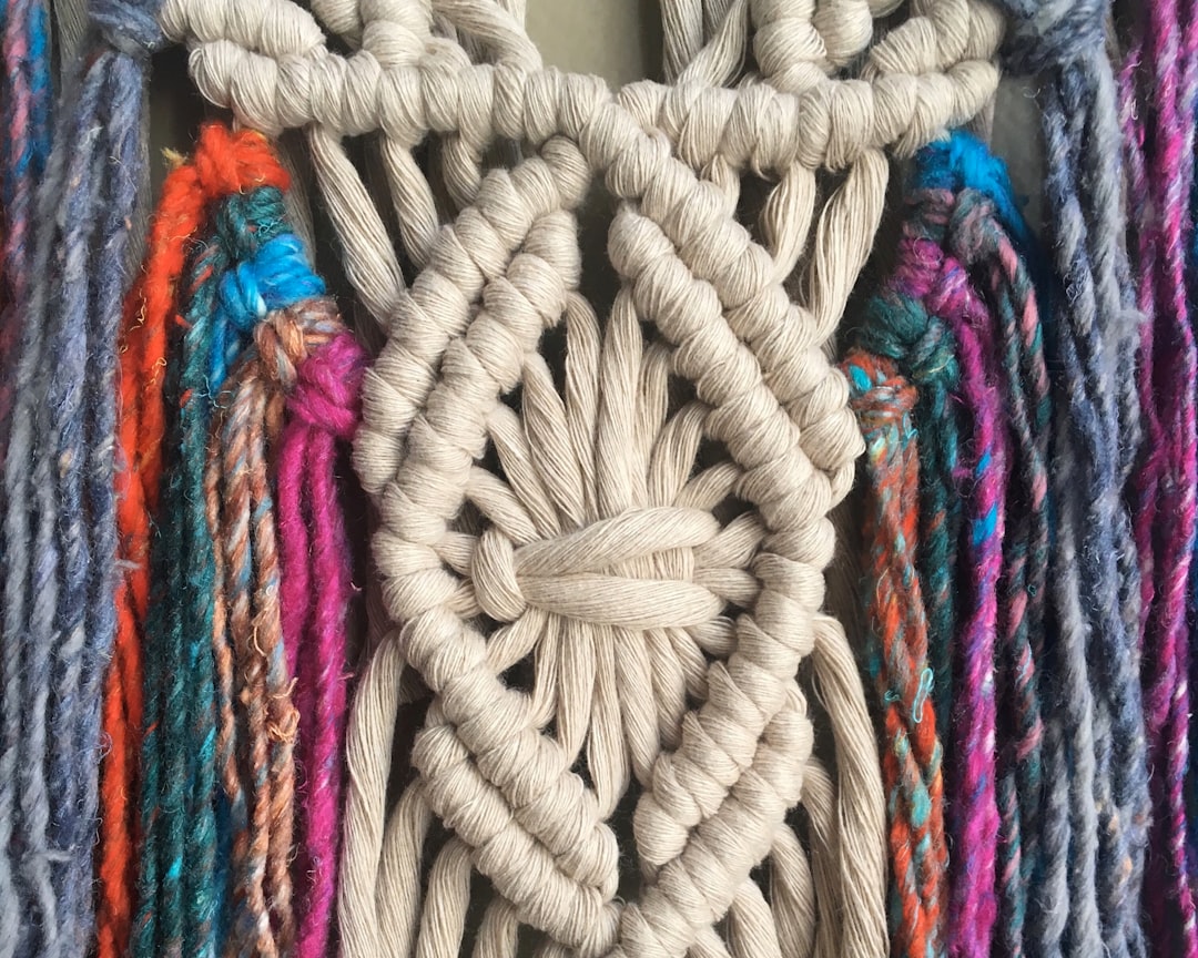 white-and-multicolored-textiles-dqgcdbe-3-a